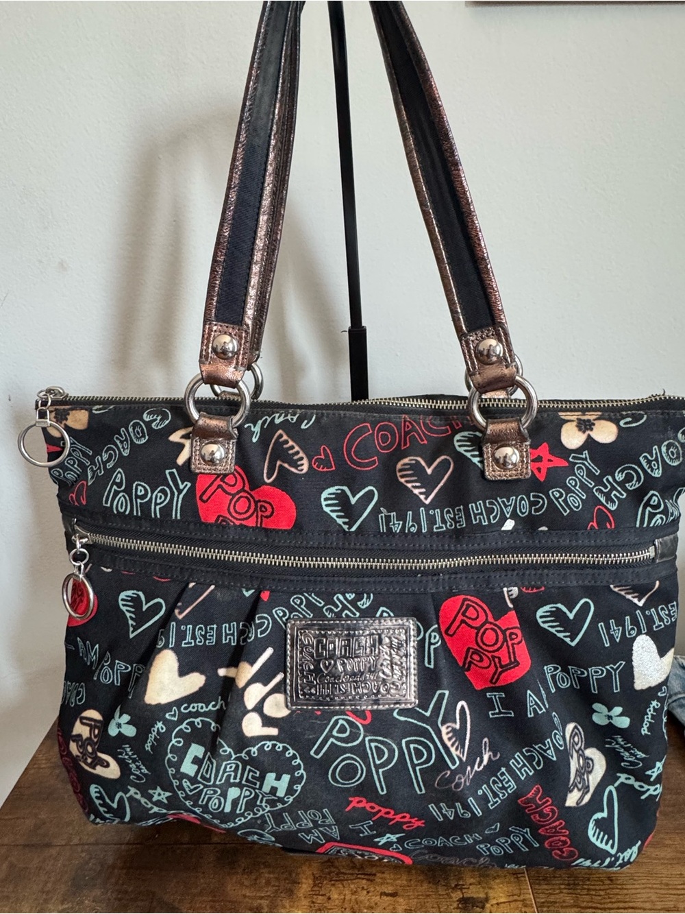 Coach Black Tote with Red, Cream & Mint Hearts and Stars Graphic Poppy Print